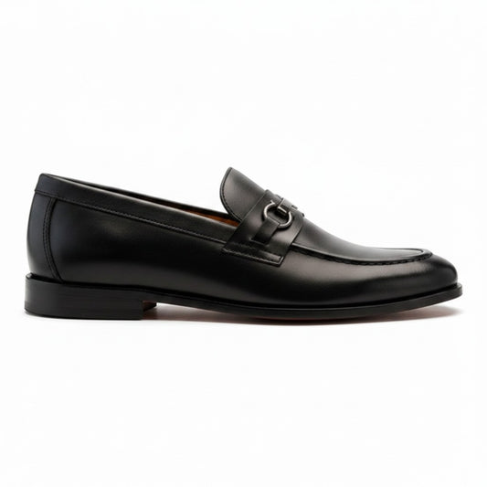 Aryaki black leather slip-on loafers with double G hardware detail. Classic dress shoe style.