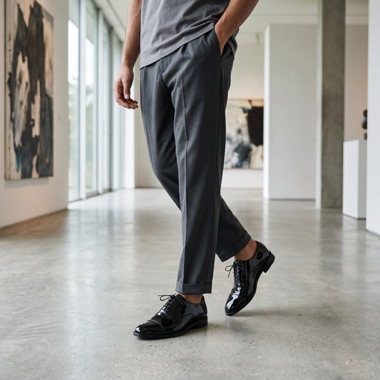 Aryaki black patent leather cap toe oxford dress shoes with lace-up closure.