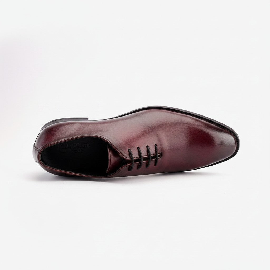 Aryaki men's burgundy leather wholecut Oxford dress shoe with a plain toe and black laces.